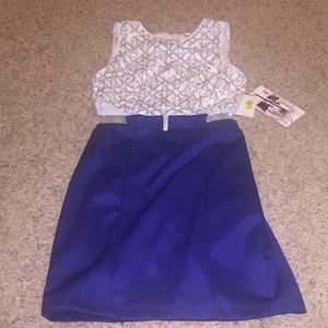 Blue, white, and silver dress with mid-rif cut out